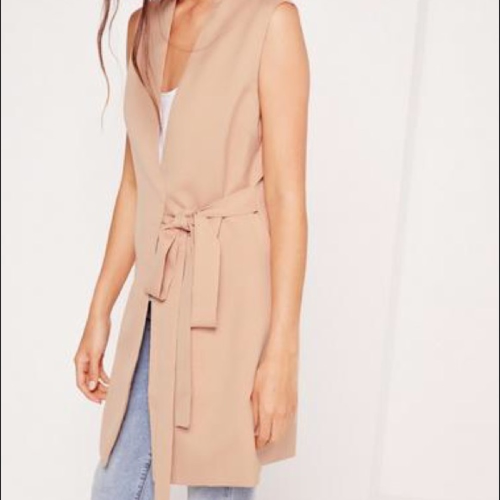 SLEEVELESS WRAP OVER TAILORED JACKET